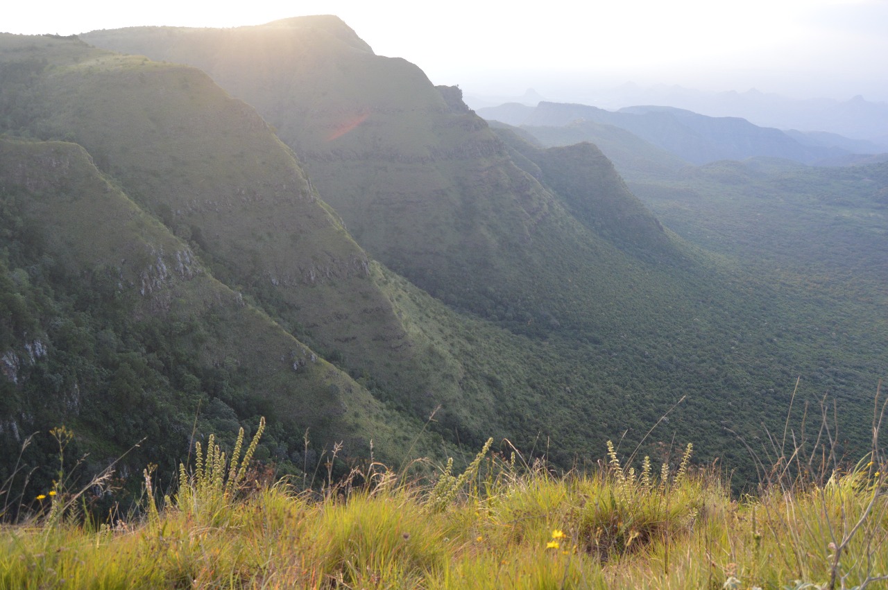 Dramatic sunrise over the lush green mountains of the Great Rift Valley in Kenya